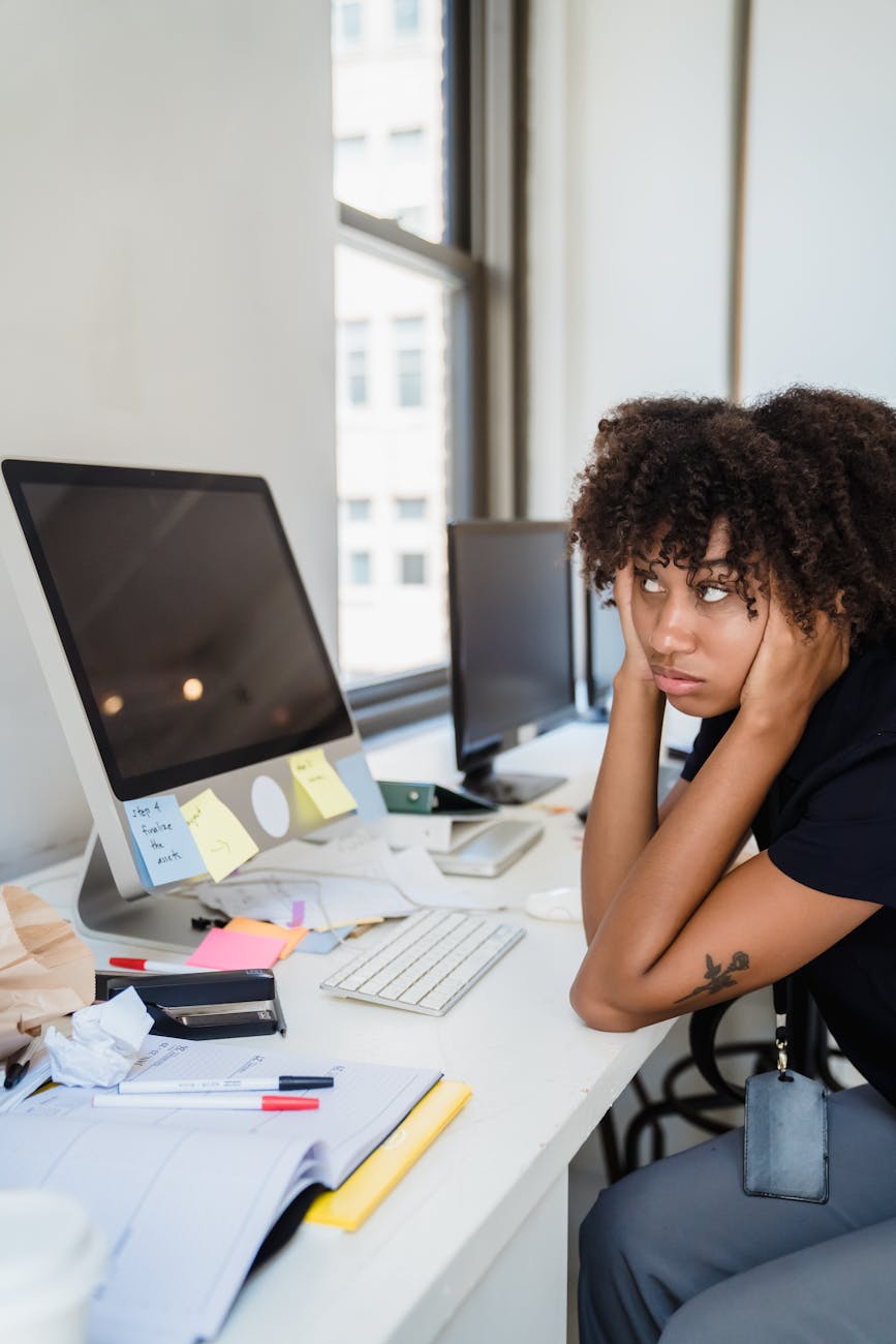 overworked woman in office