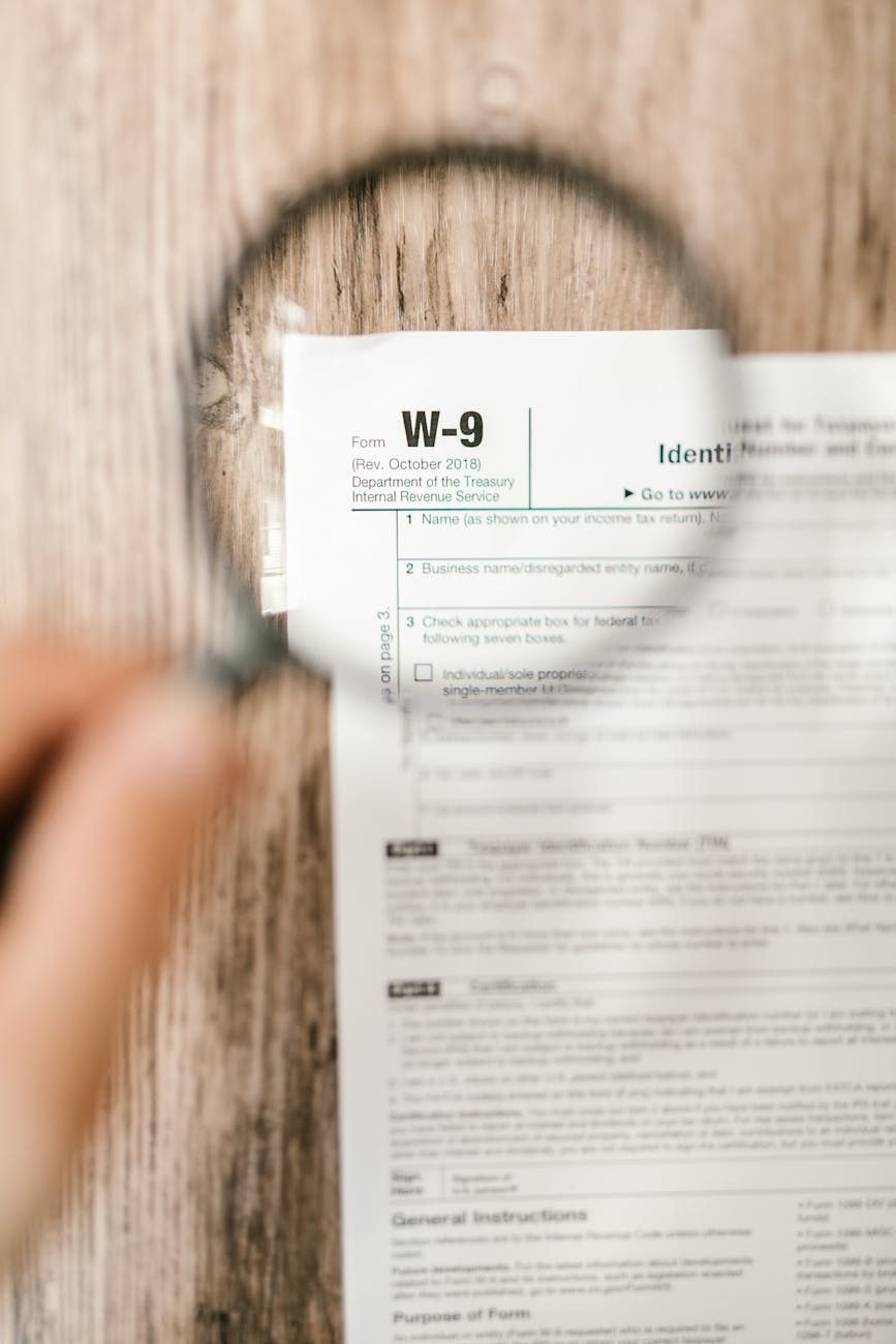 close up shot of a document through a magnifying glass